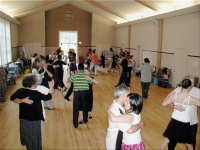 Students dancing the tango at a workshop taught by Jorge Torres